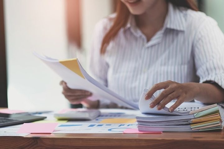 woman filing paperwork