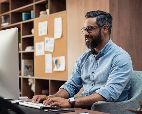 Nonprofit leadership evaluating technology costs and planning managed IT investments to improve efficiency and reduce hidden expenses.