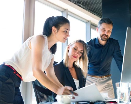Nonprofit staff using secure technology solutions and managed IT services to improve productivity while reducing operational costs.