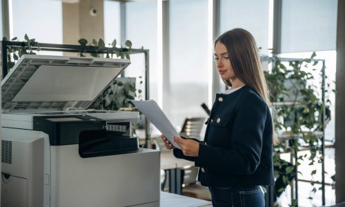 working-with-printer-beautiful-woman-is-in-the-of-2025-03-18-19-41-00-utc