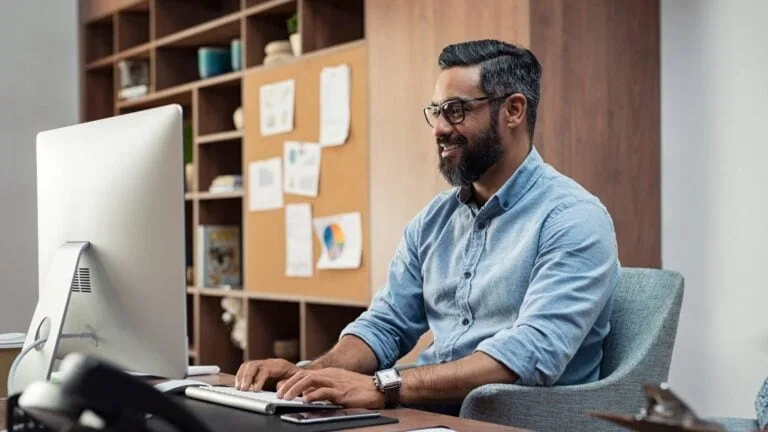 Nonprofit leadership evaluating technology costs and planning managed IT investments to improve efficiency and reduce hidden expenses.